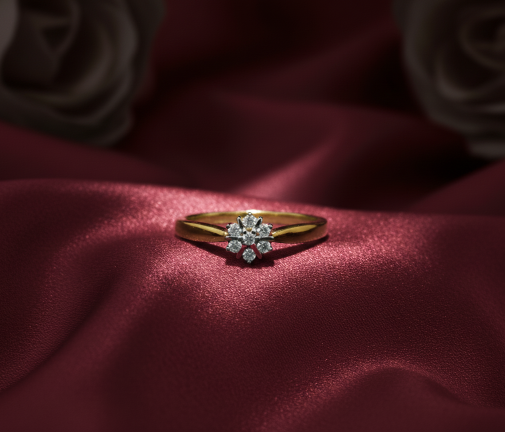Gold ring with a diamond on a red fabric background